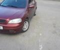 Красный Опель Астра, объемом двигателя 1.6 л и пробегом 181 тыс. км за 4900 $, фото 3 на Automoto.ua