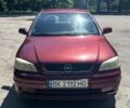 Красный Опель Астра, объемом двигателя 1.6 л и пробегом 272 тыс. км за 3500 $, фото 1 на Automoto.ua