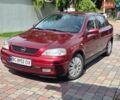 Червоний Опель Астра, об'ємом двигуна 1.39 л та пробігом 231 тис. км за 2350 $, фото 1 на Automoto.ua