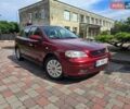 Червоний Опель Астра, об'ємом двигуна 1.39 л та пробігом 231 тис. км за 2500 $, фото 1 на Automoto.ua