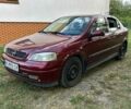 Красный Опель Астра, объемом двигателя 1.39 л и пробегом 231 тыс. км за 2400 $, фото 1 на Automoto.ua