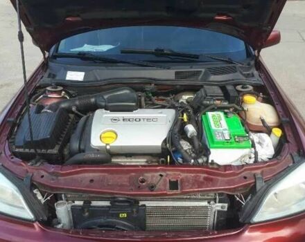 Красный Опель Астра, объемом двигателя 1.6 л и пробегом 181 тыс. км за 4900 $, фото 7 на Automoto.ua