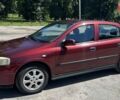 Красный Опель Астра, объемом двигателя 1.6 л и пробегом 272 тыс. км за 3500 $, фото 5 на Automoto.ua
