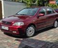 Червоний Опель Астра, об'ємом двигуна 1.39 л та пробігом 231 тис. км за 2150 $, фото 1 на Automoto.ua