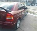 Красный Опель Астра, объемом двигателя 1.6 л и пробегом 181 тыс. км за 4900 $, фото 1 на Automoto.ua