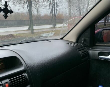 Красный Опель Астра, объемом двигателя 1.4 л и пробегом 3 тыс. км за 2300 $, фото 5 на Automoto.ua