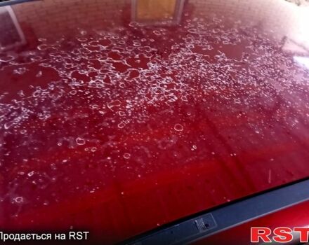 Красный Опель Астра, объемом двигателя 14 л и пробегом 430 тыс. км за 2600 $, фото 2 на Automoto.ua