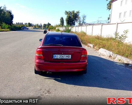 Красный Опель Астра, объемом двигателя 1.6 л и пробегом 536 тыс. км за 1660 $, фото 1 на Automoto.ua