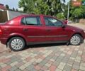 Красный Опель Астра, объемом двигателя 1.39 л и пробегом 231 тыс. км за 2350 $, фото 34 на Automoto.ua