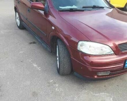 Красный Опель Астра, объемом двигателя 1.6 л и пробегом 181 тыс. км за 4900 $, фото 2 на Automoto.ua