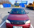 Красный Опель Астра, объемом двигателя 1.7 л и пробегом 300 тыс. км за 2000 $, фото 1 на Automoto.ua