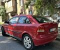Красный Опель Астра, объемом двигателя 1.6 л и пробегом 300 тыс. км за 1050 $, фото 2 на Automoto.ua