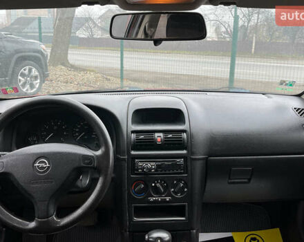 Красный Опель Астра, объемом двигателя 1.6 л и пробегом 294 тыс. км за 3699 $, фото 10 на Automoto.ua