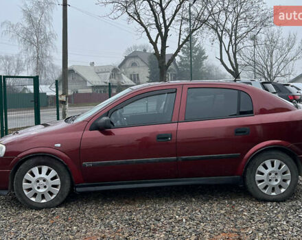 Красный Опель Астра, объемом двигателя 1.6 л и пробегом 294 тыс. км за 3699 $, фото 3 на Automoto.ua