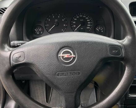 Червоний Опель Астра, об'ємом двигуна 1.6 л та пробігом 294 тис. км за 3699 $, фото 11 на Automoto.ua