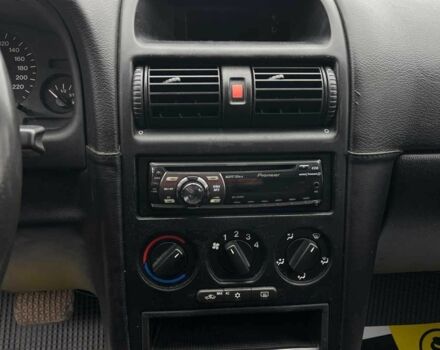 Червоний Опель Астра, об'ємом двигуна 1.6 л та пробігом 294 тис. км за 3699 $, фото 12 на Automoto.ua