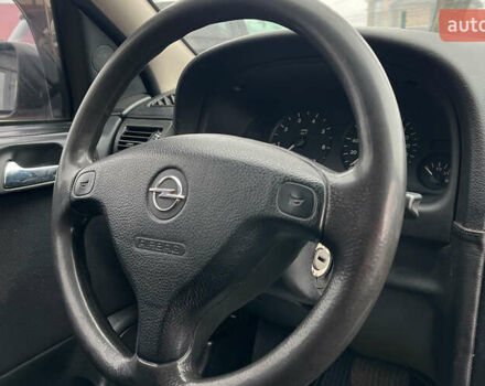 Красный Опель Астра, объемом двигателя 1.6 л и пробегом 294 тыс. км за 3699 $, фото 15 на Automoto.ua