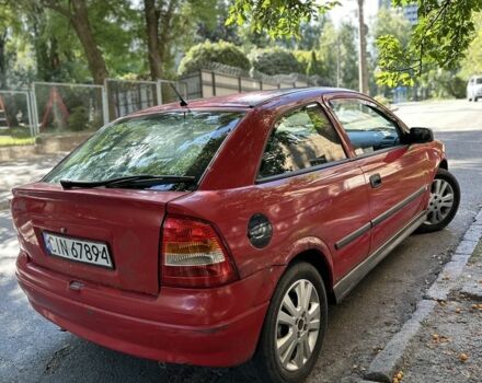 Красный Опель Астра, объемом двигателя 1.6 л и пробегом 300 тыс. км за 1050 $, фото 3 на Automoto.ua