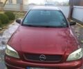 Красный Опель Астра, объемом двигателя 1.6 л и пробегом 293 тыс. км за 3250 $, фото 1 на Automoto.ua