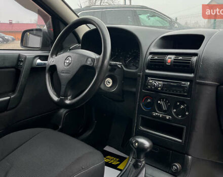 Красный Опель Астра, объемом двигателя 1.6 л и пробегом 294 тыс. км за 3699 $, фото 16 на Automoto.ua