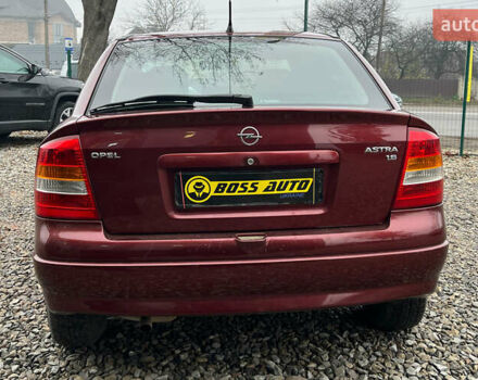 Красный Опель Астра, объемом двигателя 1.6 л и пробегом 294 тыс. км за 3699 $, фото 5 на Automoto.ua