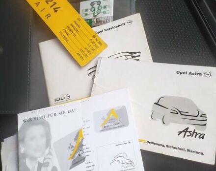 Красный Опель Астра, объемом двигателя 1.6 л и пробегом 293 тыс. км за 3250 $, фото 4 на Automoto.ua