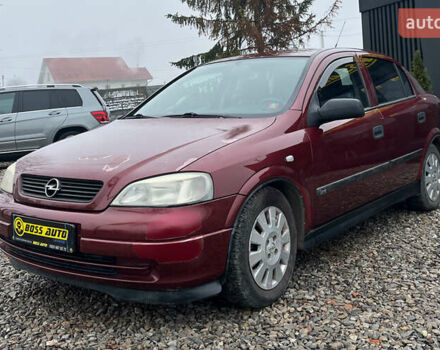 Красный Опель Астра, объемом двигателя 1.6 л и пробегом 294 тыс. км за 3699 $, фото 2 на Automoto.ua