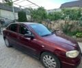 Красный Опель Астра, объемом двигателя 1.6 л и пробегом 250 тыс. км за 2999 $, фото 1 на Automoto.ua