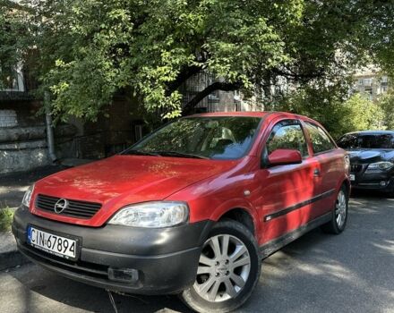 Красный Опель Астра, объемом двигателя 1.6 л и пробегом 300 тыс. км за 1050 $, фото 1 на Automoto.ua