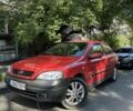 Красный Опель Астра, объемом двигателя 1.6 л и пробегом 300 тыс. км за 1050 $, фото 1 на Automoto.ua
