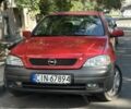 Красный Опель Астра, объемом двигателя 1.6 л и пробегом 300 тыс. км за 1050 $, фото 1 на Automoto.ua