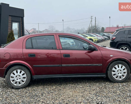 Красный Опель Астра, объемом двигателя 1.6 л и пробегом 294 тыс. км за 3699 $, фото 7 на Automoto.ua