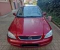 Красный Опель Астра, объемом двигателя 1.5 л и пробегом 312 тыс. км за 2520 $, фото 1 на Automoto.ua