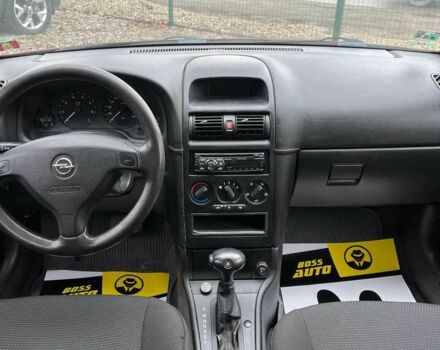 Червоний Опель Астра, об'ємом двигуна 1.6 л та пробігом 294 тис. км за 3699 $, фото 9 на Automoto.ua