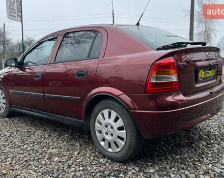 Красный Опель Астра, объемом двигателя 1.6 л и пробегом 294 тыс. км за 3699 $, фото 4 на Automoto.ua