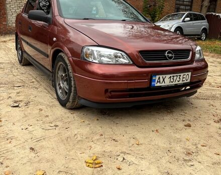 Красный Опель Астра, объемом двигателя 1.4 л и пробегом 250 тыс. км за 2800 $, фото 2 на Automoto.ua