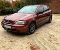 Красный Опель Астра, объемом двигателя 1.4 л и пробегом 250 тыс. км за 2800 $, фото 1 на Automoto.ua
