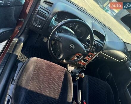 Червоний Опель Астра, об'ємом двигуна 2 л та пробігом 279 тис. км за 4100 $, фото 1 на Automoto.ua