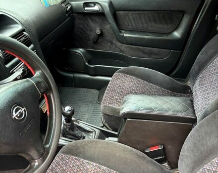 Красный Опель Астра, объемом двигателя 1.4 л и пробегом 250 тыс. км за 2800 $, фото 6 на Automoto.ua