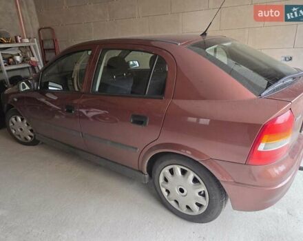 Красный Опель Астра, объемом двигателя 1.4 л и пробегом 114 тыс. км за 4100 $, фото 1 на Automoto.ua