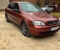 Красный Опель Астра, объемом двигателя 1.4 л и пробегом 250 тыс. км за 2800 $, фото 1 на Automoto.ua