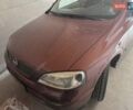 Красный Опель Астра, объемом двигателя 1.4 л и пробегом 114 тыс. км за 4100 $, фото 1 на Automoto.ua