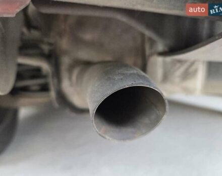 Красный Опель Астра, объемом двигателя 1.4 л и пробегом 114 тыс. км за 4100 $, фото 3 на Automoto.ua