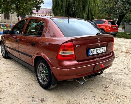 Красный Опель Астра, объемом двигателя 1.4 л и пробегом 250 тыс. км за 2800 $, фото 4 на Automoto.ua