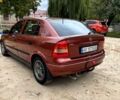 Красный Опель Астра, объемом двигателя 1.4 л и пробегом 250 тыс. км за 2800 $, фото 4 на Automoto.ua