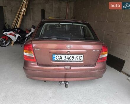 Красный Опель Астра, объемом двигателя 1.4 л и пробегом 114 тыс. км за 4100 $, фото 2 на Automoto.ua