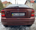 Красный Опель Астра, объемом двигателя 1.2 л и пробегом 327 тыс. км за 3200 $, фото 5 на Automoto.ua