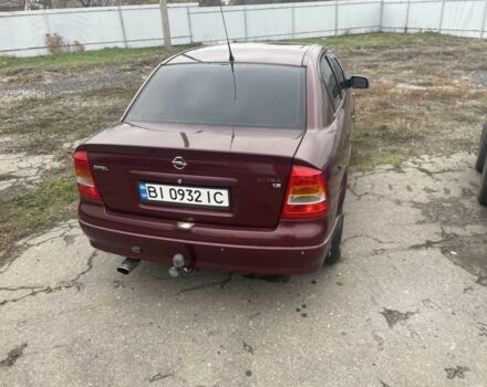 Красный Опель Астра, объемом двигателя 1.6 л и пробегом 270 тыс. км за 4000 $, фото 5 на Automoto.ua