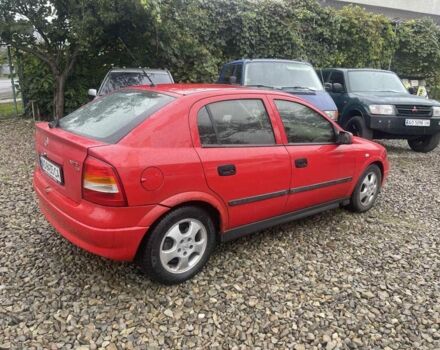 Красный Опель Астра, объемом двигателя 1.8 л и пробегом 300 тыс. км за 2200 $, фото 1 на Automoto.ua