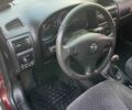 Красный Опель Астра, объемом двигателя 1.6 л и пробегом 270 тыс. км за 4000 $, фото 2 на Automoto.ua